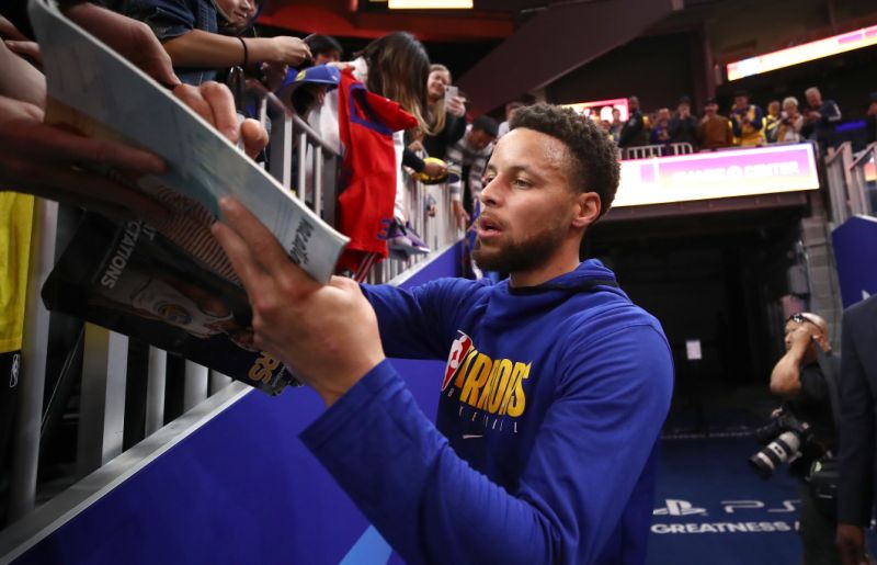 NBA players are being encouraged to limit physical interaction with fans. (Photo by Ezra Shaw/Getty Images)