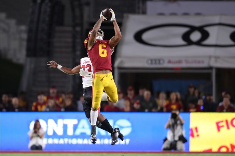 USC wide receiver Michael Pittman Jr. catches a deep jump ball over Utah defensive back Julian Blackmon for a touchdown on Sept. 20, 2019. They will be Indianapolis Colts teammates. (Photo by Peter Joneleit/Icon Sportswire via Getty Images)