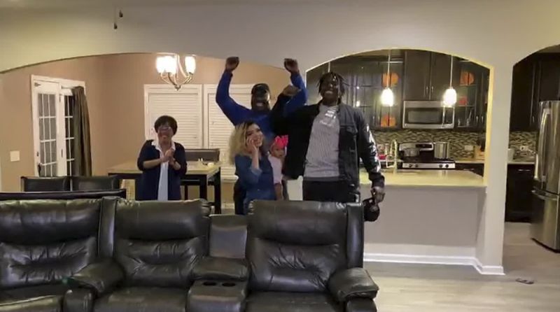 Javon Kinlaw, right, celebrates after being selected by the San Francisco 49ers during the first round of the 2020 NFL draft. (Photo by NFL via Getty Images)