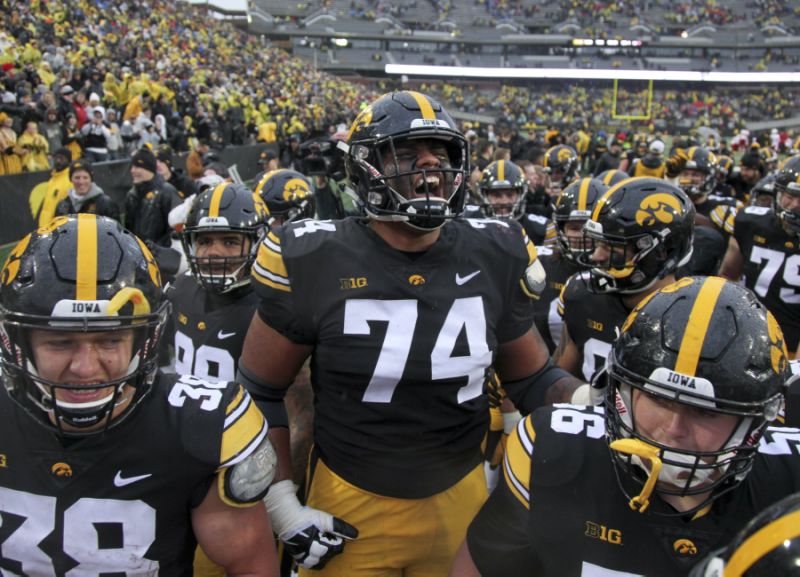 Iowa offensive lineman Tristan Wirfs celebrates with teammates after a 2018 game at Kinnick Stadium, in Iowa City, Iowa. (Photo by Matthew Holst/Getty Images)